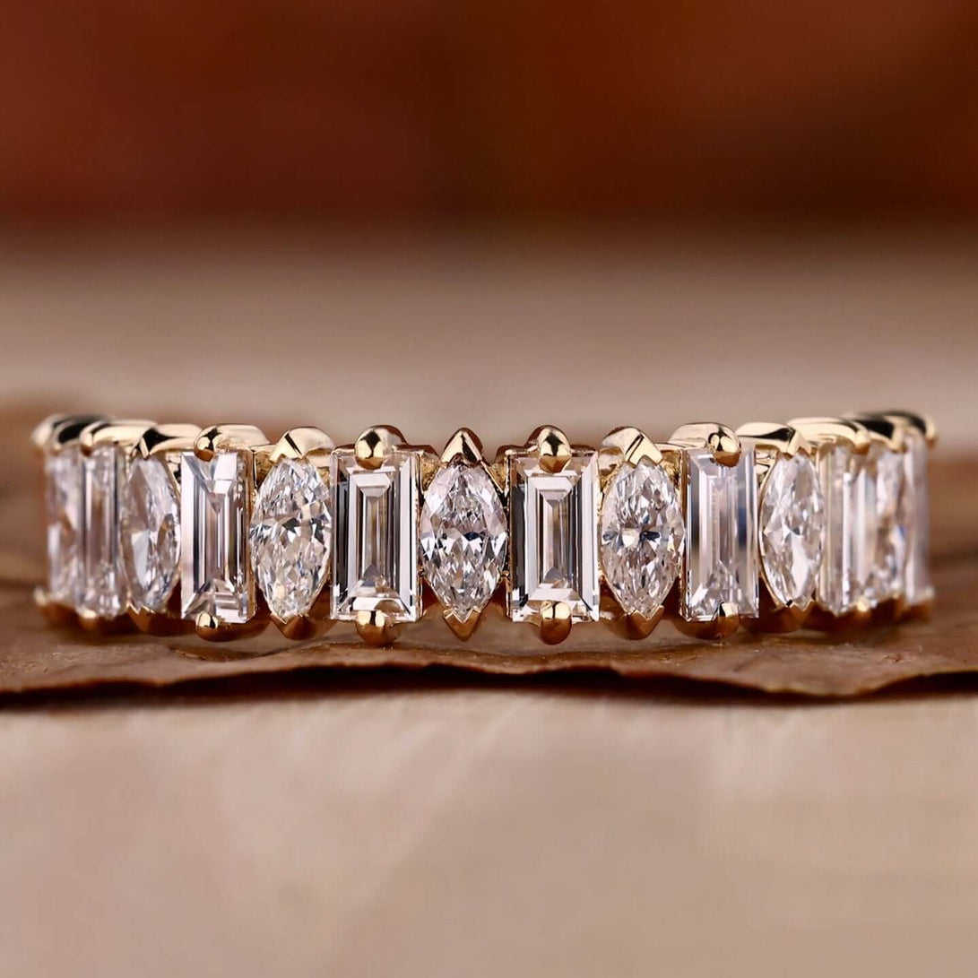 marquise baguette lab grown diamond band yellow gold close up