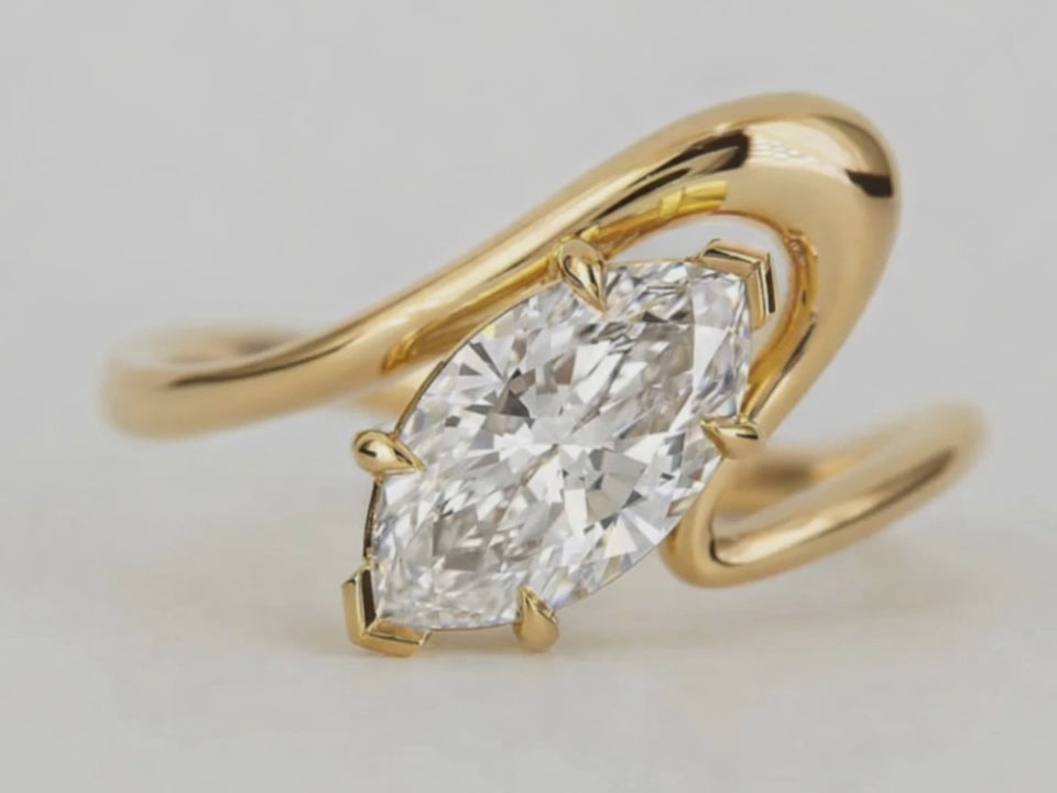 SEÓRA | Axis Curve Marquise Ring, CZ Brass Band