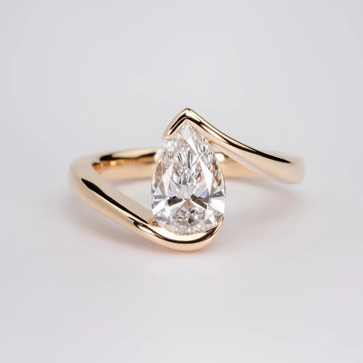 Pear Cut Moissanite Ring in 18K Gold, Open Wrap Engagement Ring | SEÓRA