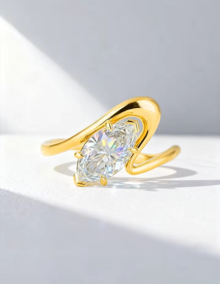 SEÓRA | Axis Curve Marquise Ring, CZ Brass Band