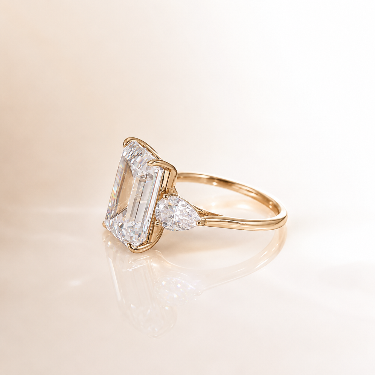4Ct Emerald Cut Moissanite Ring with Pear Side Stones | 18 K Gold | SEÓRA
