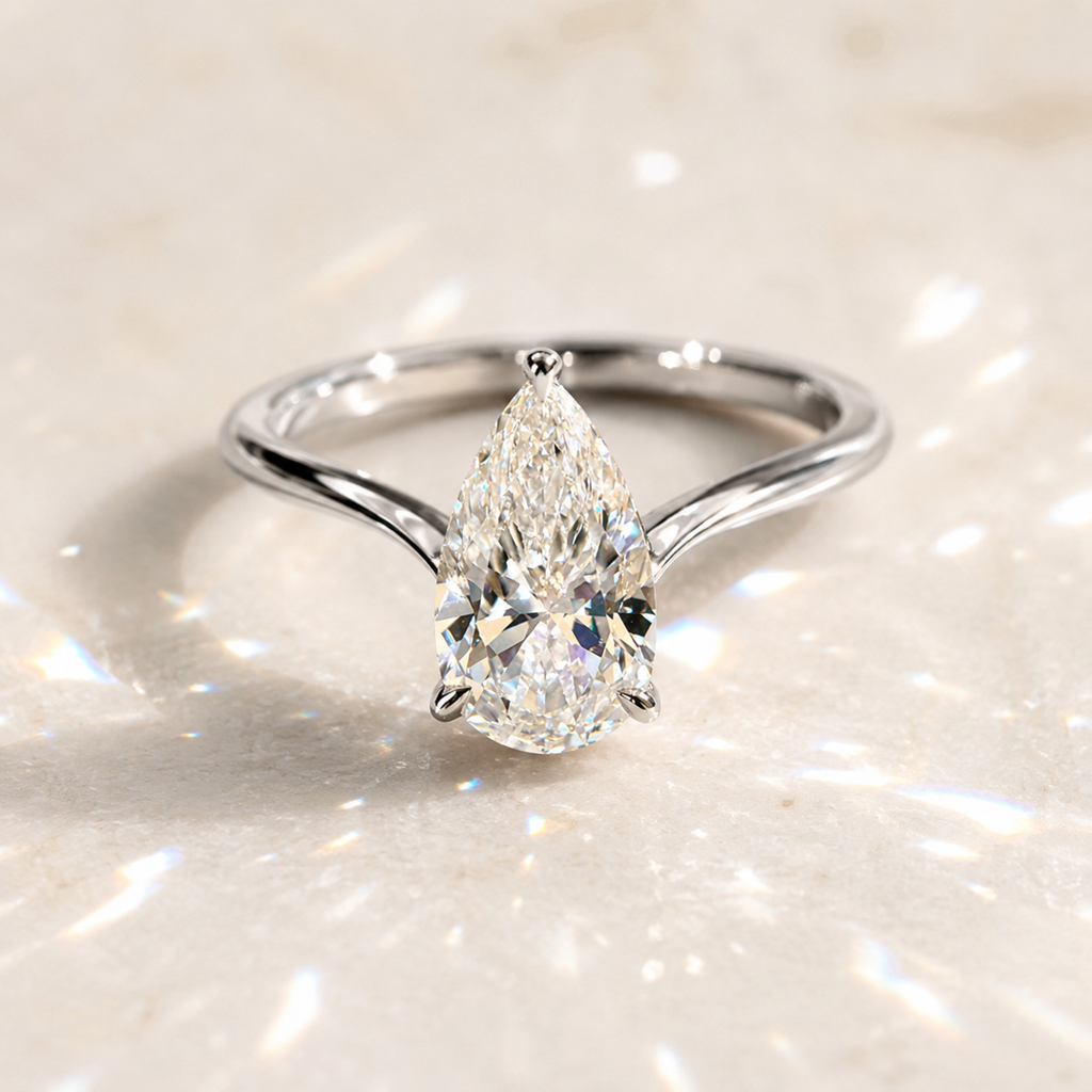 Pear Cut Moissanite Open Wrap Ring – 18K Gold
