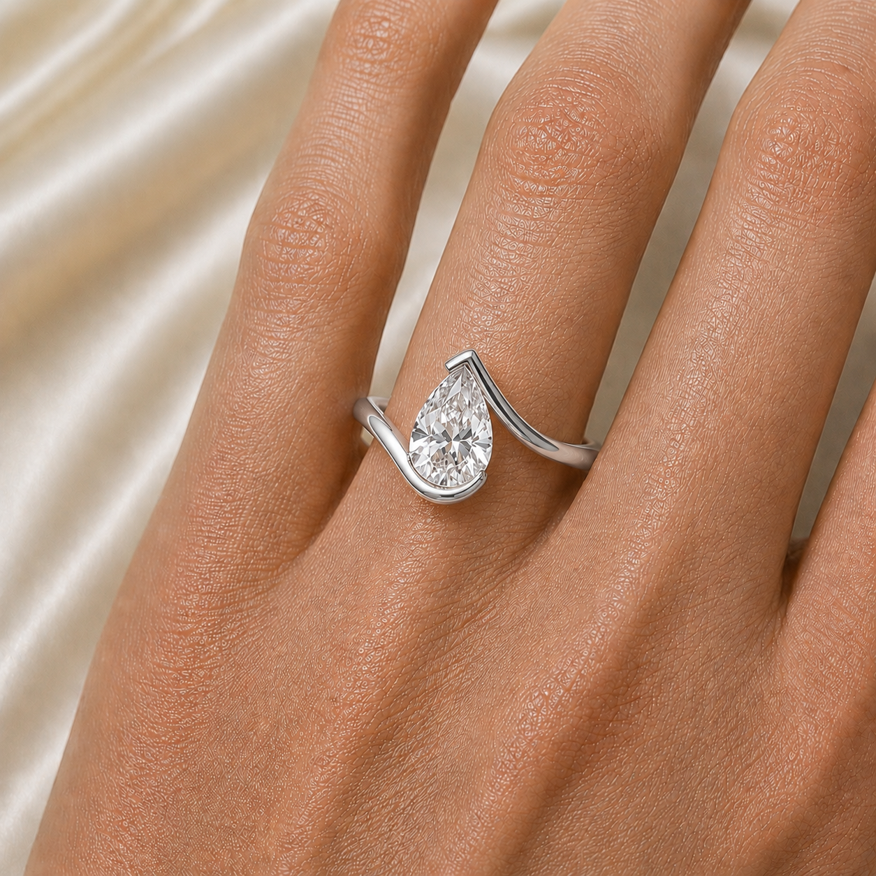 Pear Cut Moissanite Ring in 18K Gold, Open Wrap Engagement Ring | SEÓRA