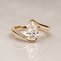 Pear Cut Moissanite Ring in 18K Gold, Open Wrap Engagement Ring | SEÓRA