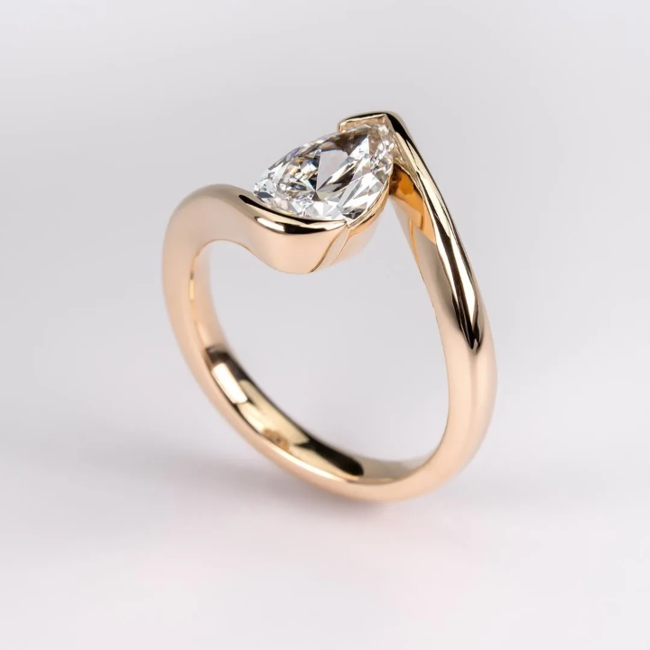 Pear Cut Moissanite Ring in 18K Gold, Open Wrap Engagement Ring | SEÓRA
