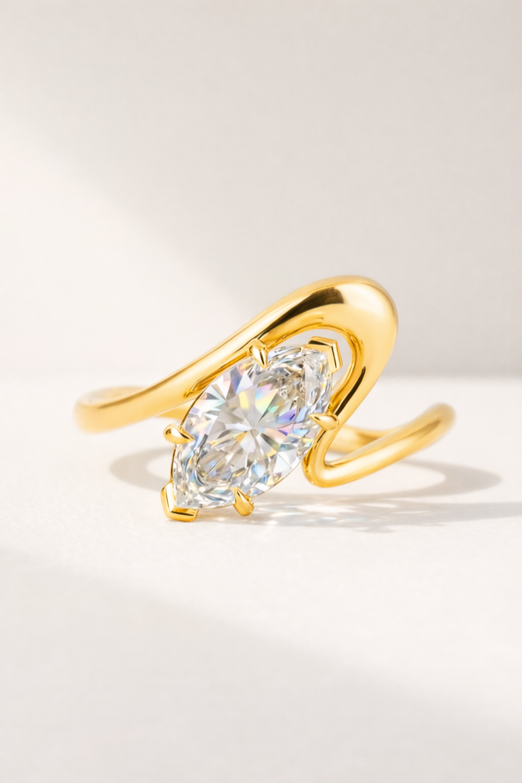 SEÓRA | Axis Curve Marquise Ring, CZ Brass Band