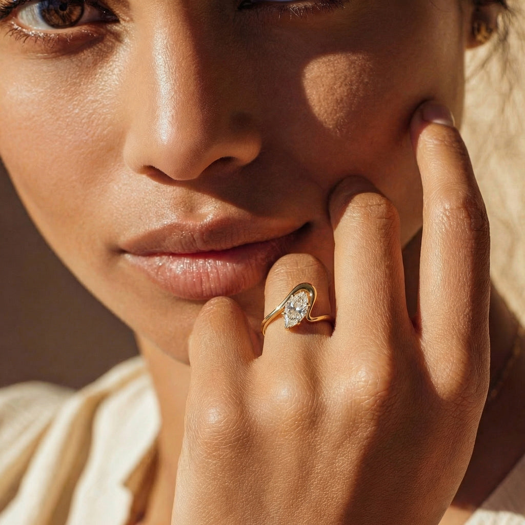 SEÓRA | Axis Curve Marquise Ring, CZ Brass Band